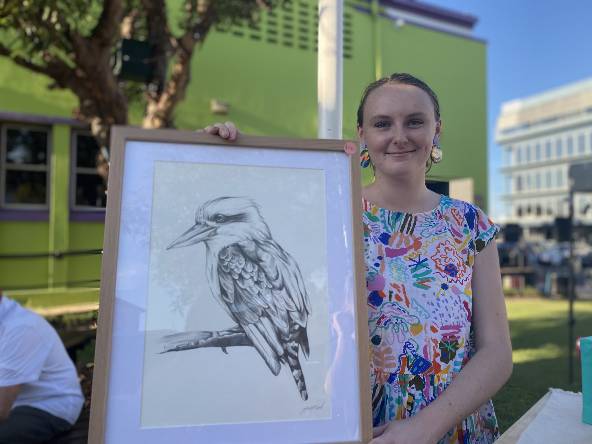 Jamie McLeod at her Young Creators Market 2020 stall showcasing earrings, orginal art, prints and ornaments by Jamie McLeod Art Young Creators