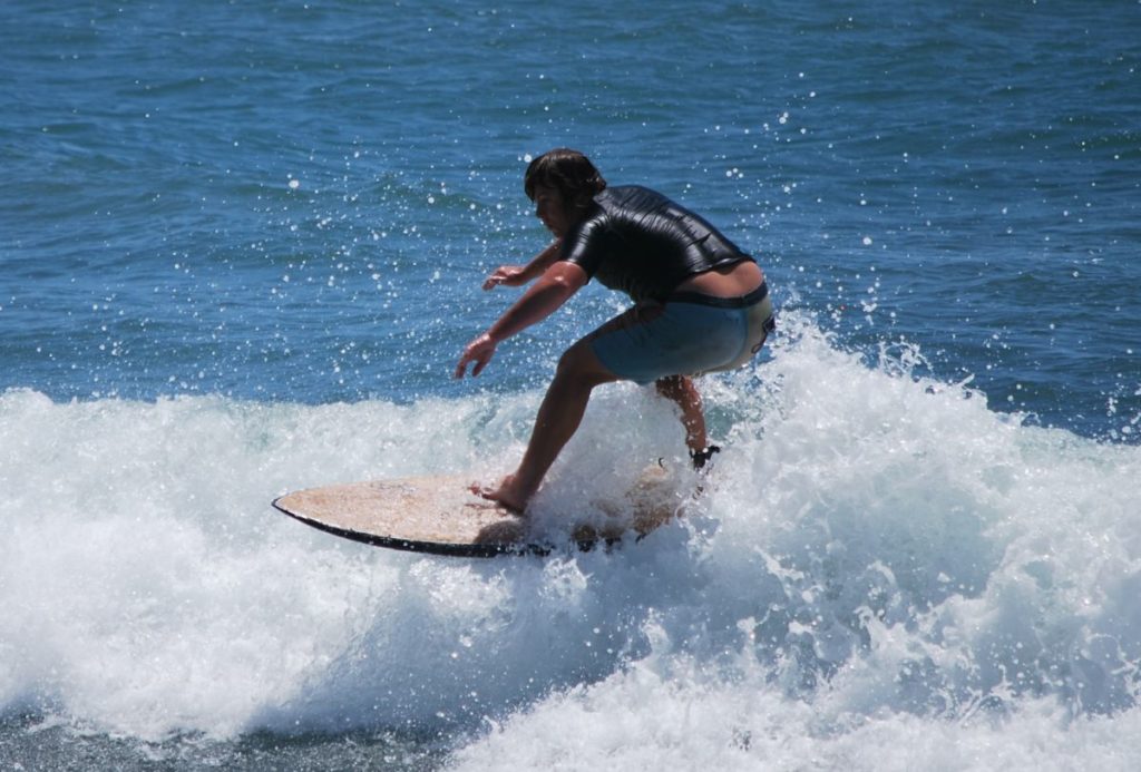 Surfing at Neilson Park Beach