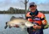 Keith Whalley with his 80cm barramundi caught at Lake Monduran, Gin Gin.
