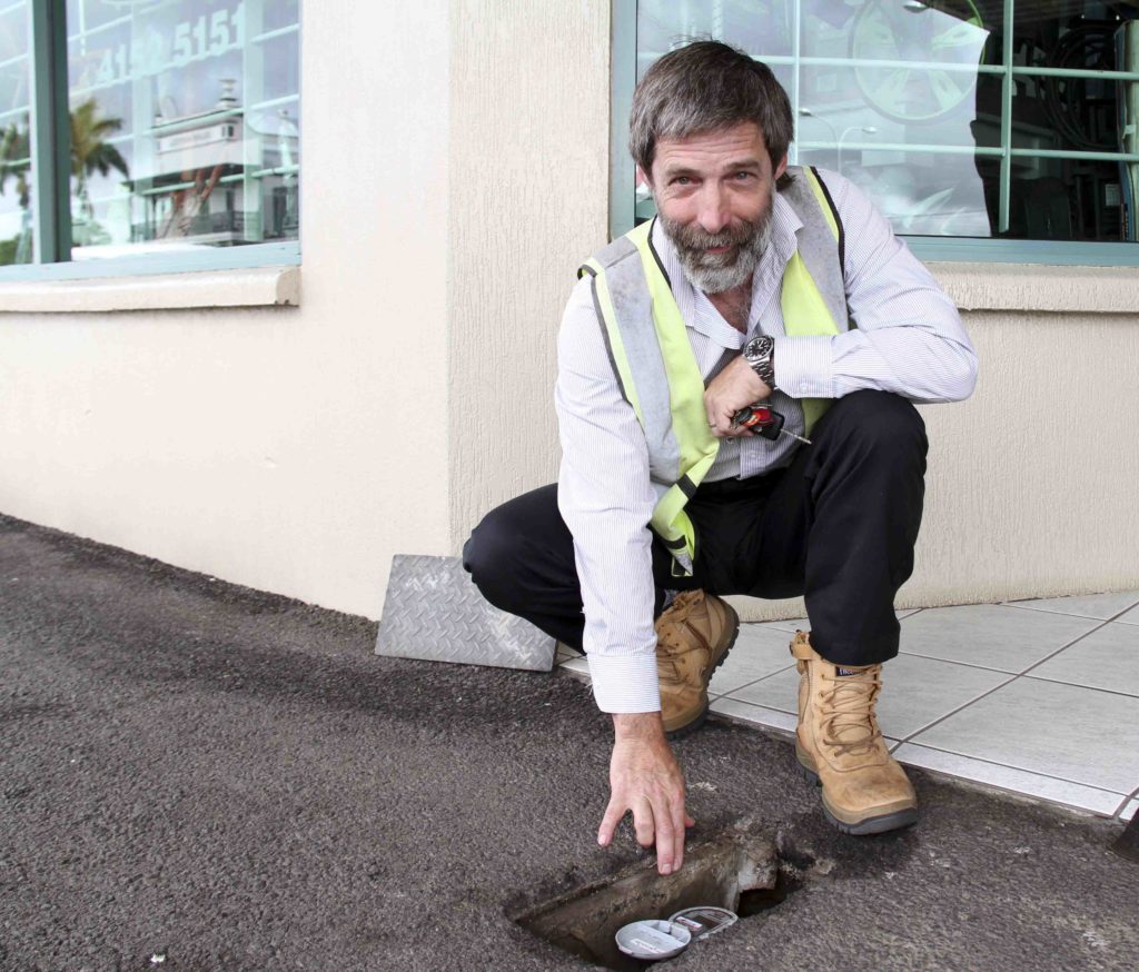 Geoff Tansley with a recently installed smart water meter