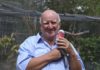 Local parrot expert John Kluth with his favourite bird, the galah