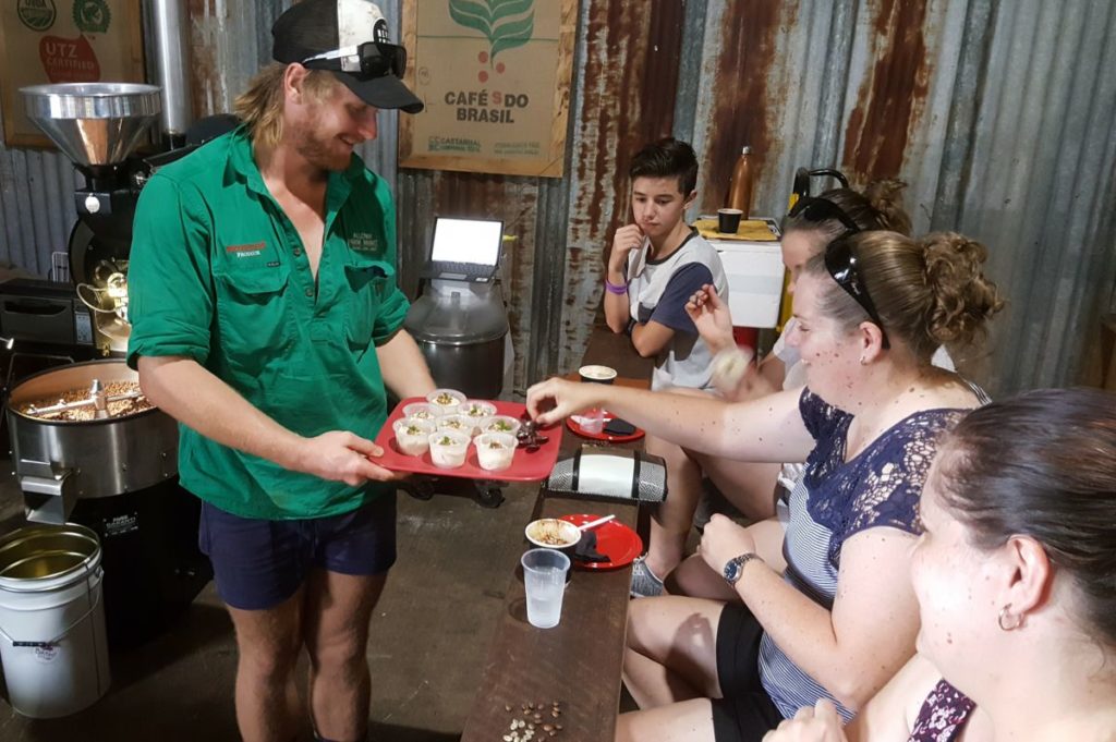 Ash Emerick from Alloway Farm Market serves tasty caramelised fig ice-cream to a visiting Bundy Food Tours group.