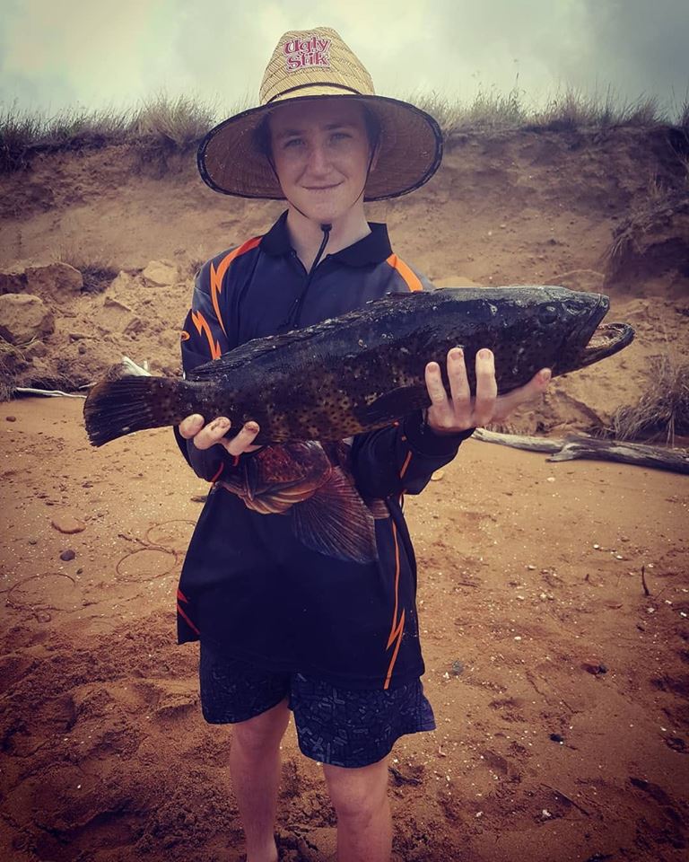 Cody Madden with a black spot cod.