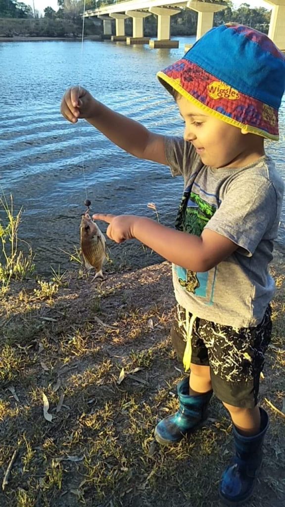 Hudson Schiffke is proud of his bream. 