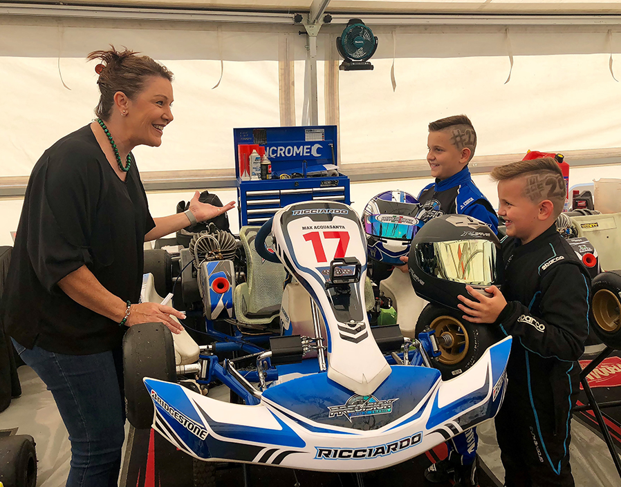 Cr Helen Blackburn chats with Oliver and Max Acquasanta about their karts.