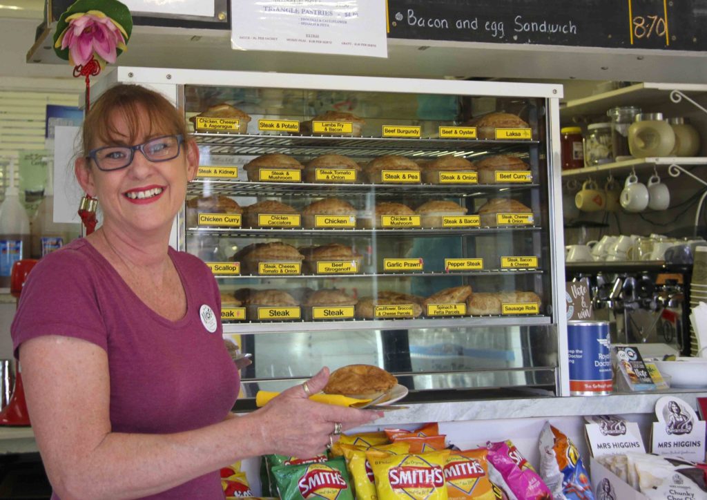 Traveller's Rest Cafe owner Jenny Gourley with one of their famous garlic prawn pies.