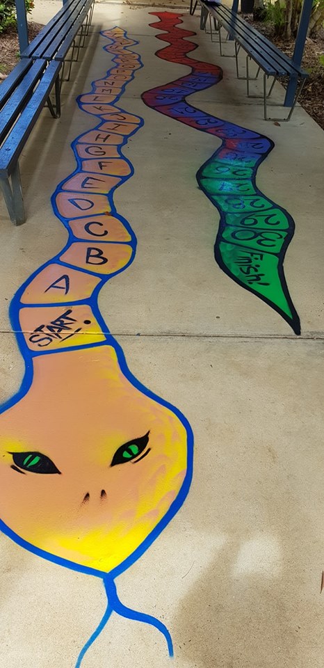 Alphabet snake artwork at Elliott Heads State School, Jamie Kirby Raw Awakening