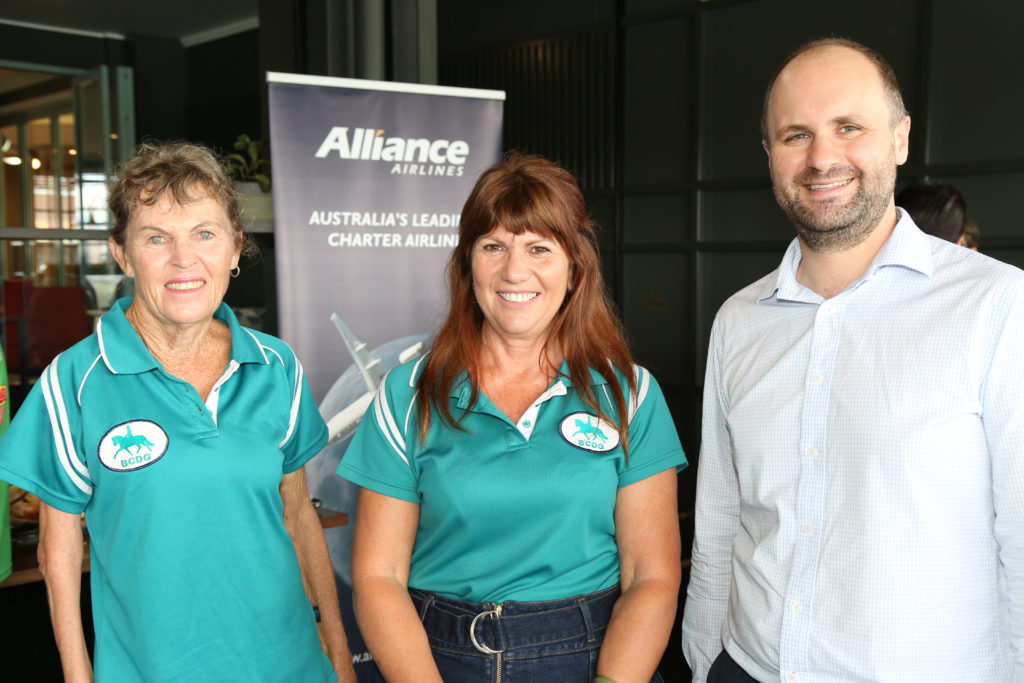 Bundaberg Country Dressage Club Committee Member Annika Croaker and Treasurer Susan Draganoff with Alliance Airlines National Charter Sales Manager Alex Ananian-Cooper.