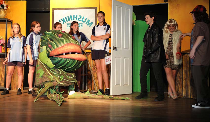 Bundaberg State High School students rehearse for their Little Shop of Horrors performance.