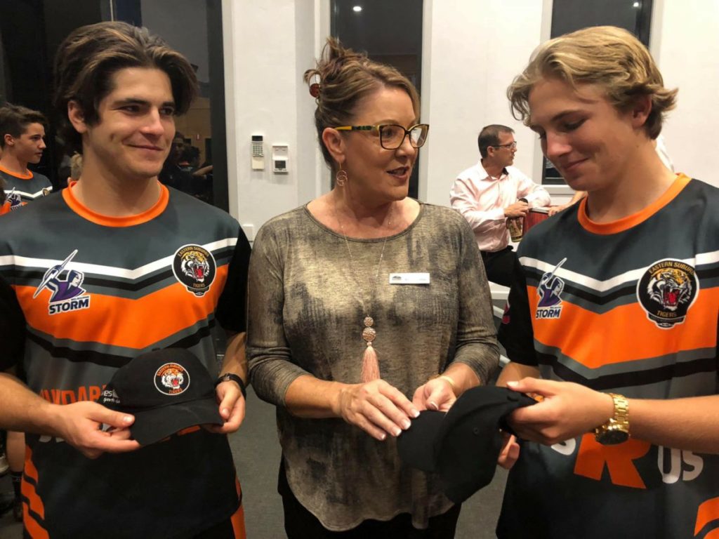 Cr Helen Blackburn with Eastern Suburbs Tigers Wide Bay Development Academy players Brendan Grills and Harrison Bull.