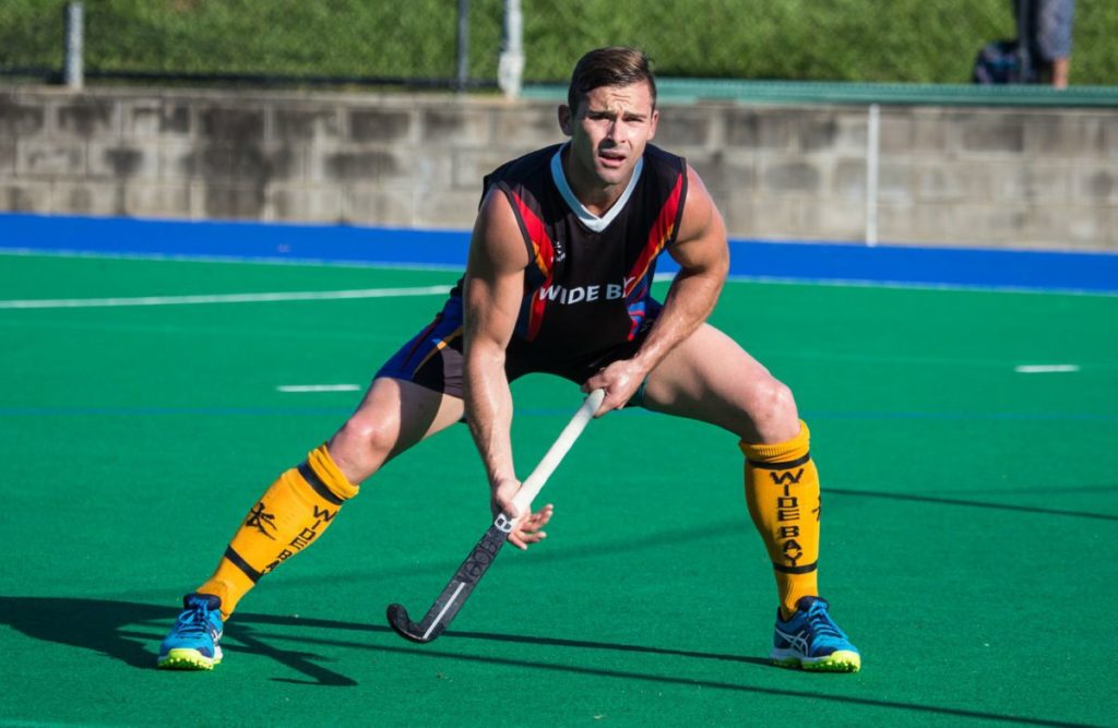 Bundaberg hockey player Cale Cramer in action for Wide Bay Thunder