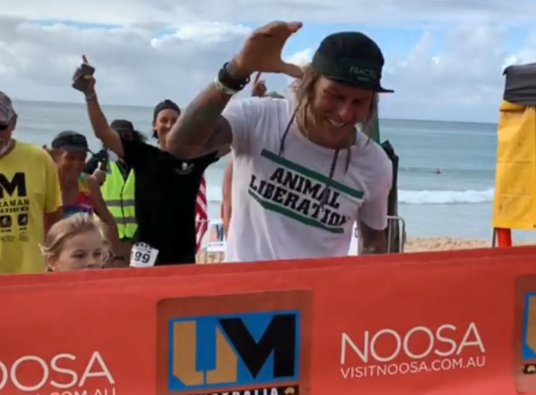 Bargara ultraman Mat Grills crosses the finish line at Ultraman Australia