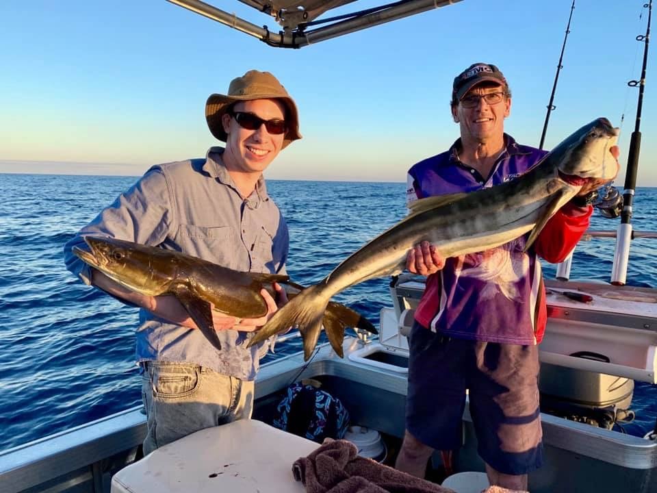 Daniel Westerman and Mike Webb with some cobia caught offshore.