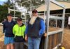Shane Kenny and Chavez Walters with teacher Dan Matthew in front of the new cattle loading ramp they built at the Gin Gin Showgrounds.