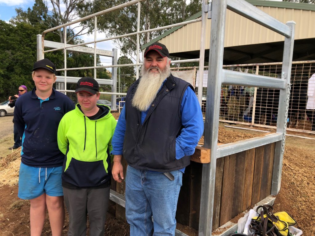 Shane Kenny and Chavez Walters with teacher Dan Matthew in front of the new cattle loading ramp they built at the Gin Gin Showgrounds.