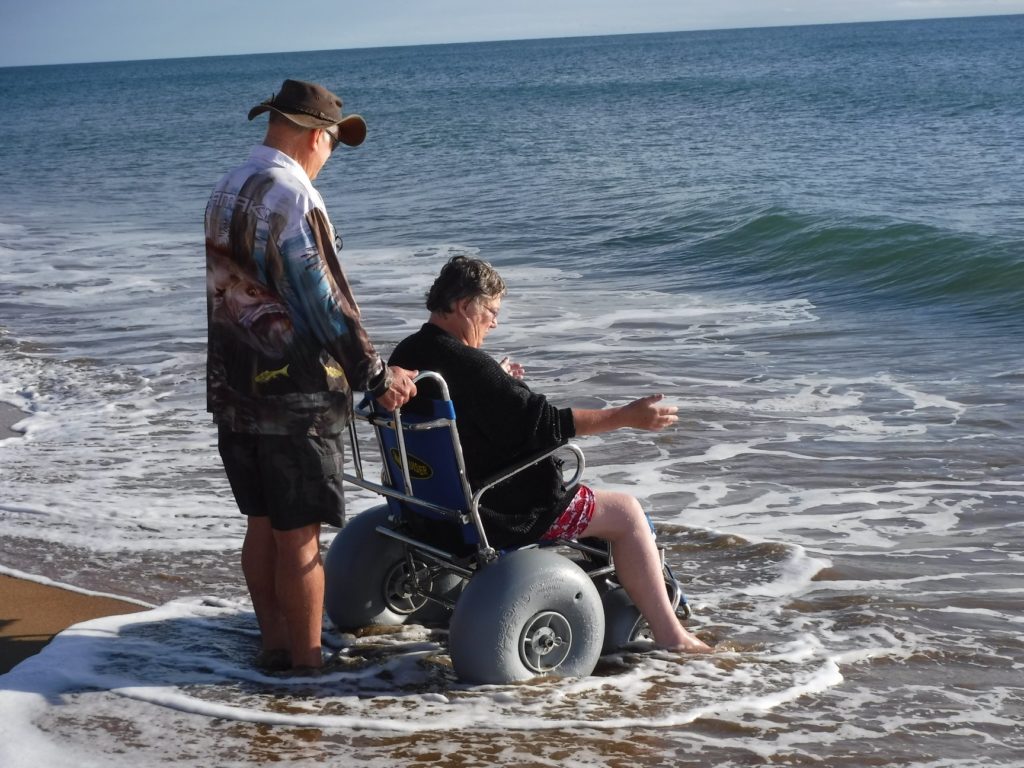 This is the moment Janine dipped her toes in the ocean for the first time in 20 years. 