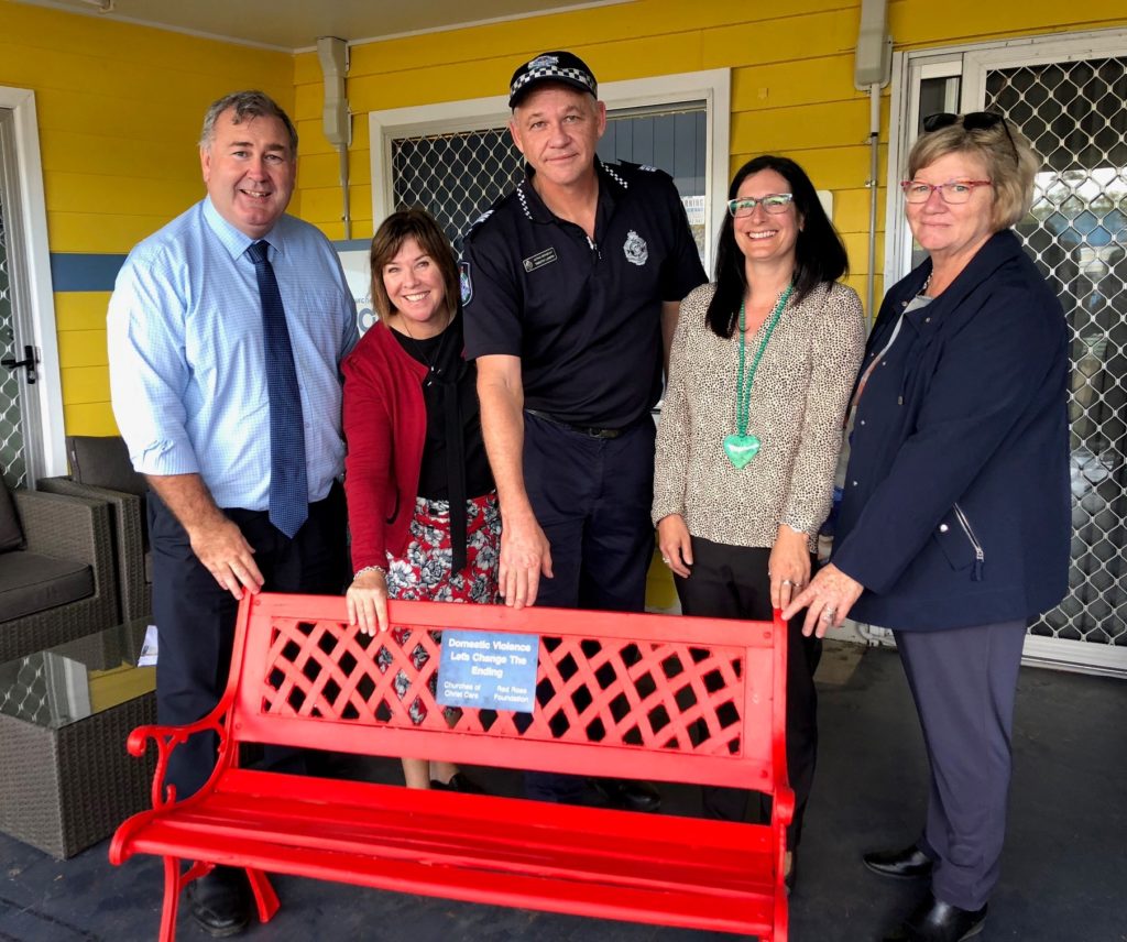 Red Bench supporters: Bundaberg Region Mayor Jack Dempsey and Acting Sergeant Tim Lowth with Churches of Christ Care staff.