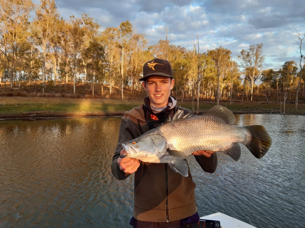 Matthew Smith at Monduran  Dam with a nice barra.