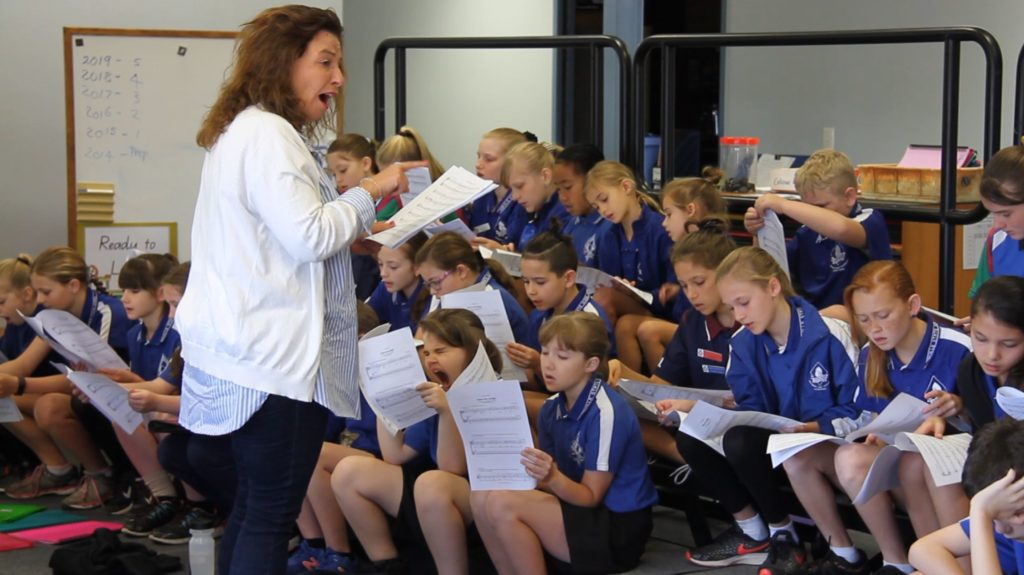 Michelle Leonard OAM with Norville State School students for a choir workshop