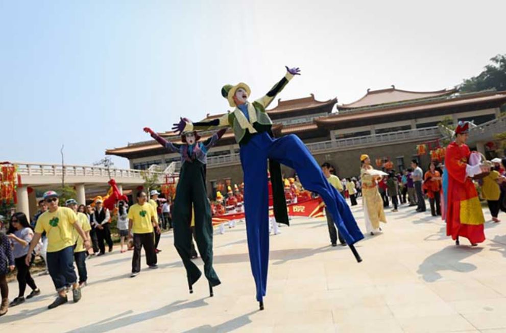 Look up! Stilt walkers will be wandering through the crowds on festival day. 