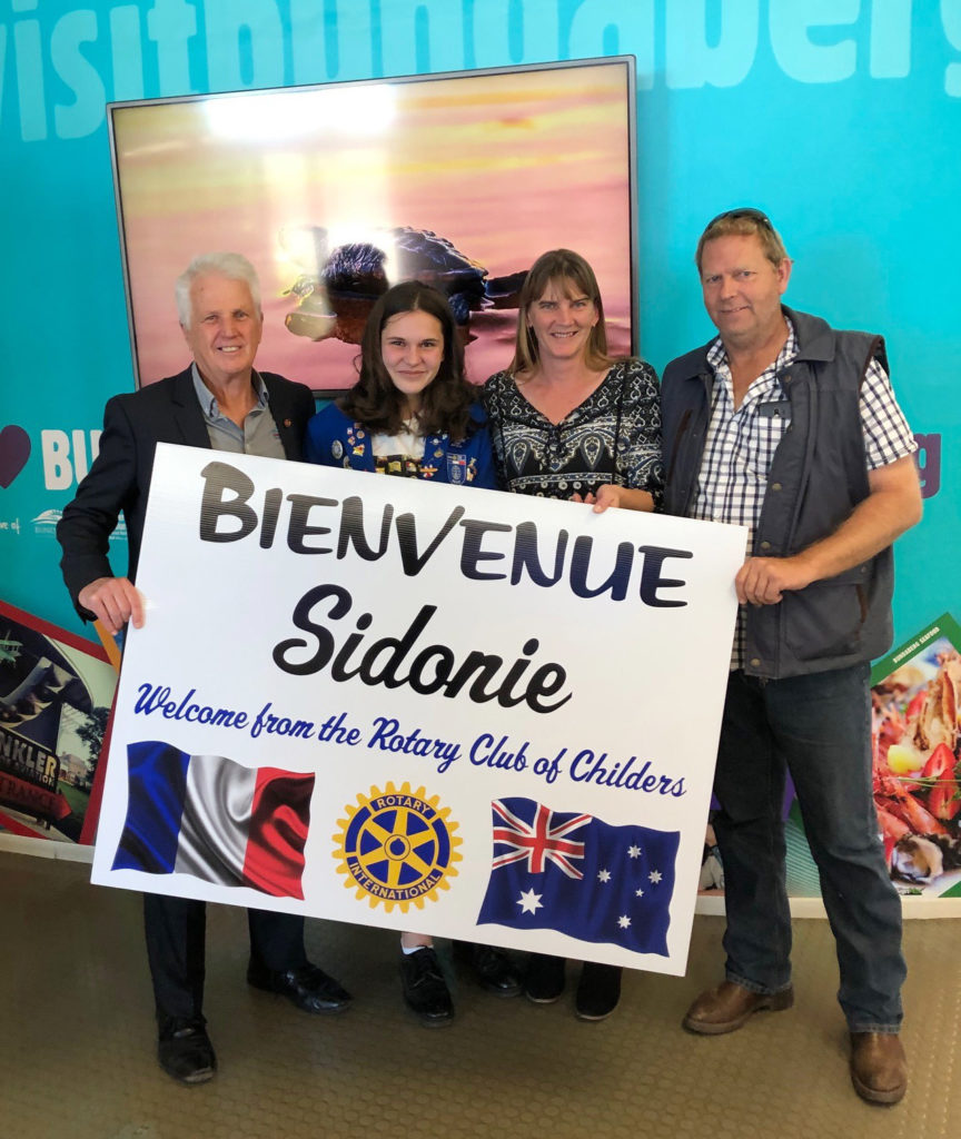 French Rotary Youth Exchange student Sidonie Sourice is welcome to the Bundaberg Region by Childers Rotary Club members (from left) Wayne Heidrich, Kerry and Kris Smythe.