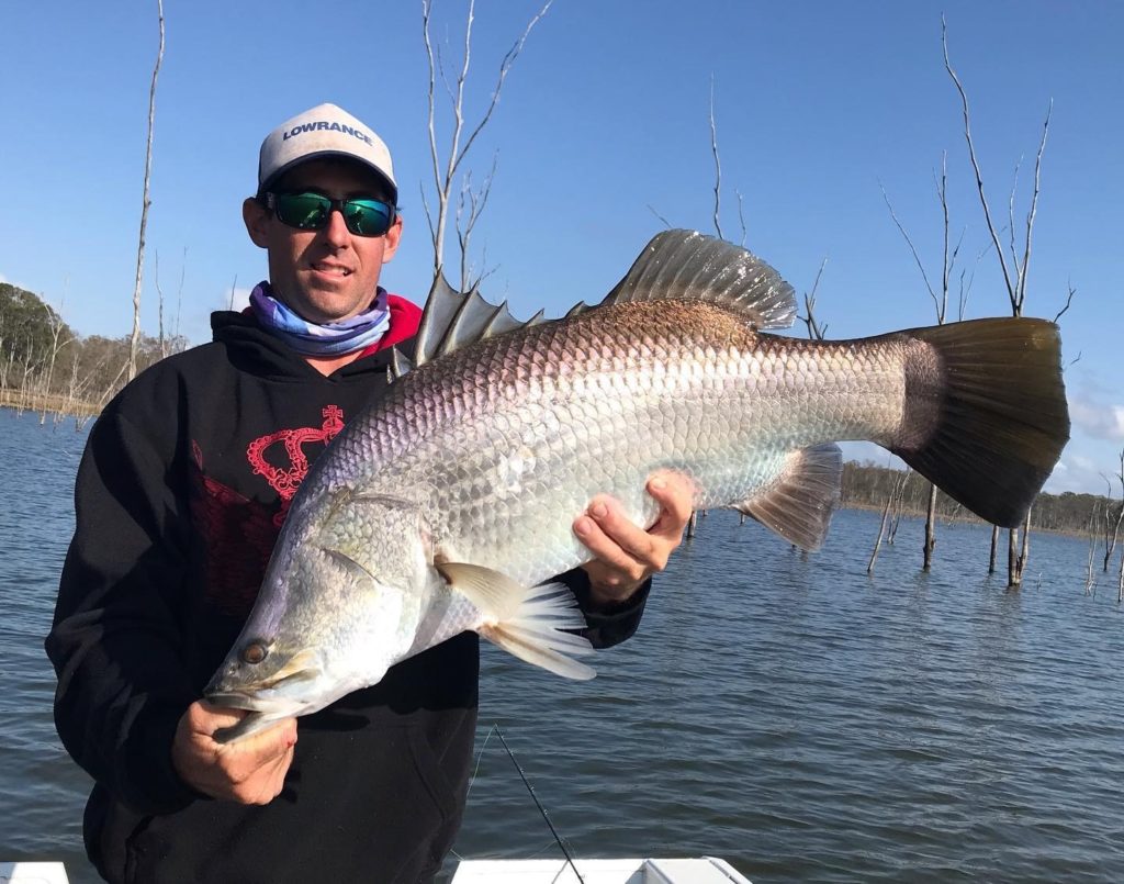 Steve King with a ripper Lake Monduran barra.