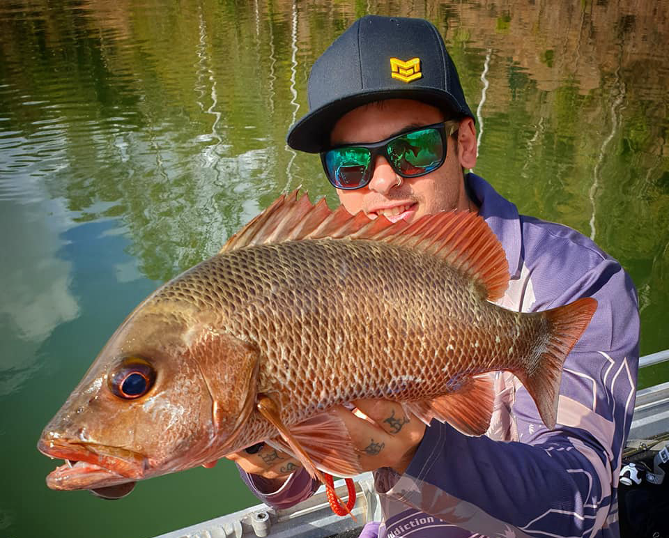 Kolan Baffle: Ricky Wilson with a mangrove jack.