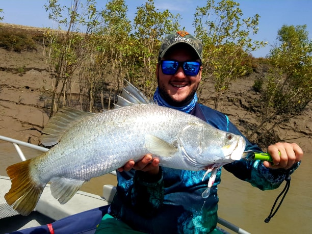 Corey Torres with a big barramundi.