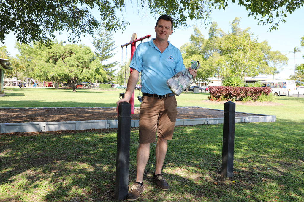Replas spokesperson Darren White with the Alexandra Park bollards. Each bollard is made up of 2,250 pieces of soft plastic.