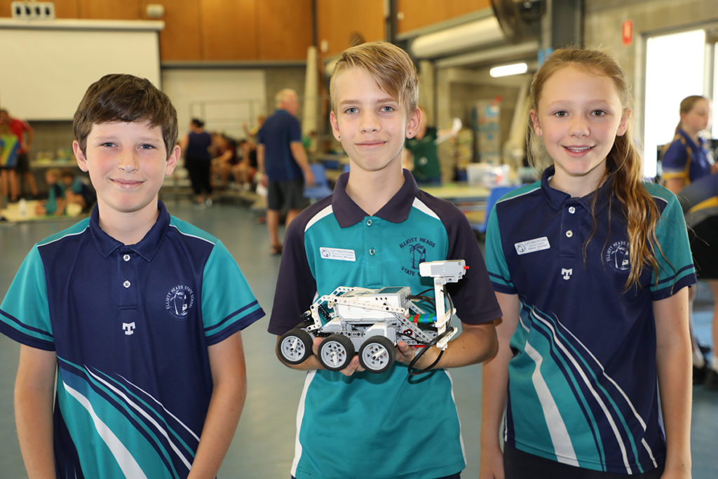 Thomas Wicks, Mitchel Morgan and Sienna Haselden from Elliot Heads State School compete in the Robocup Competition.