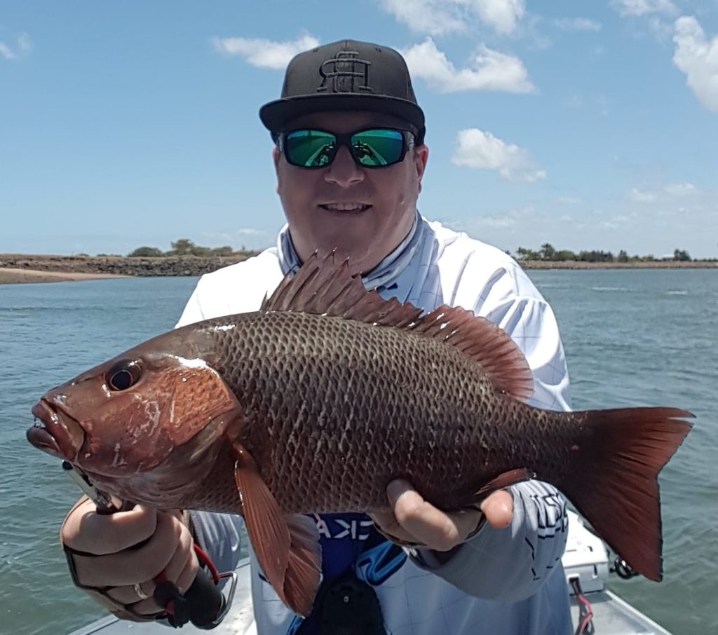 Tim Mulhall with a mangrove jack from the Burnett.