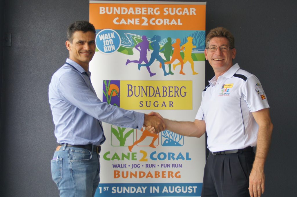 Bundaberg Sugar representative Giuseppe Barazza with Bundaberg SugarCane2Coral committee president Jason Pascoe.