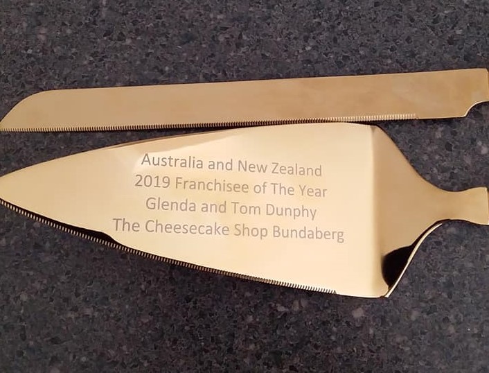 The award was presented to Glenda and Tom Dunphy at The Cheesecake Shop Bundaberg.