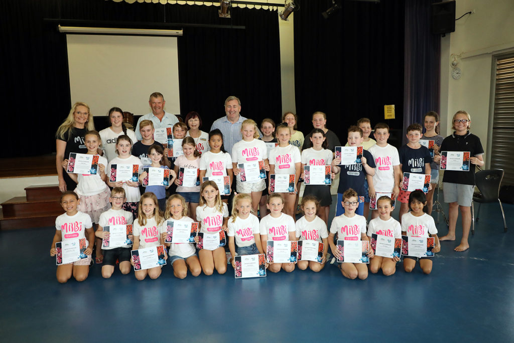 Major Jack Dempsey with Milbi performers from Kalkie State School.