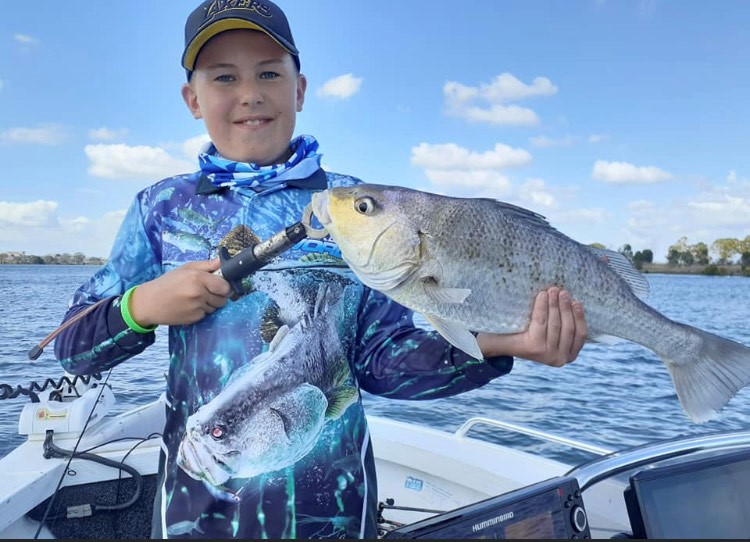 Ashton Anderson with the 56cm grunter he caught recently.