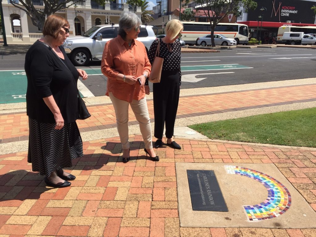 Delegation pays respects at the Caroline Stuttle Rainbow Memorial