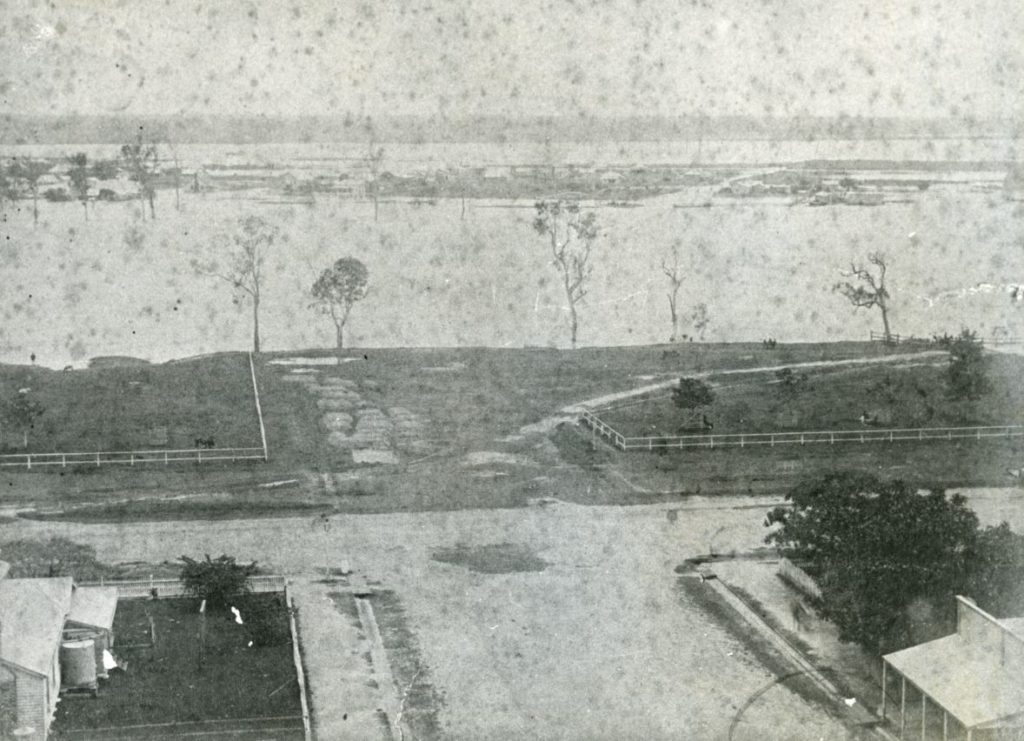 Barolin Street looking to Burnett River during flooding in 1872.