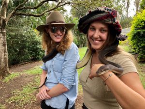 Getting acquainted with “Ollie” the Olive Python at Snakes Downunder were visitors Anne James (left) and Jane Callan.