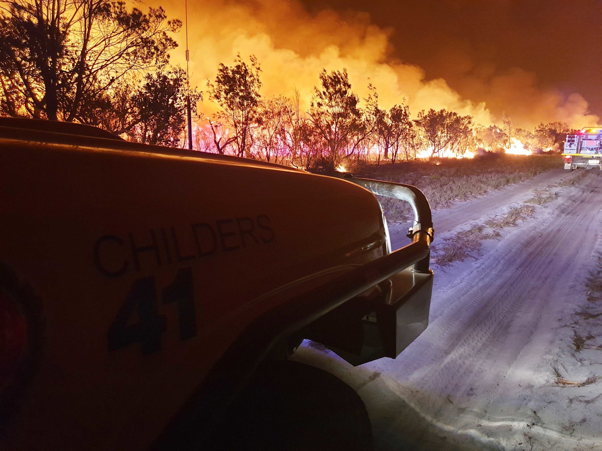 Childers fire crews in action during the November 2019 fires in the Burrum Coast National Park near Woodgate Beach.