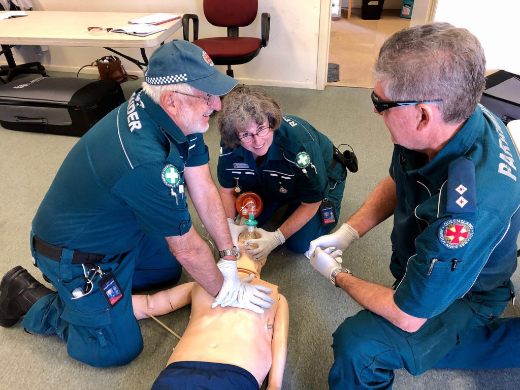 QAS Paramedic and instructor Warren Smith delivers pointers on resuscitation methods to Woodgate First Responders Greg and Wendy McLaughlin.