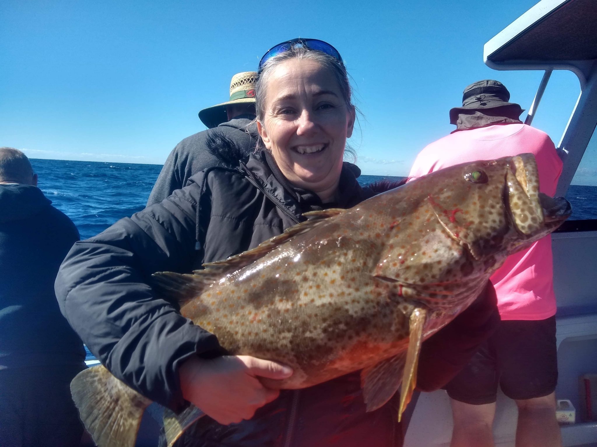 Donna Scrivener with the cod she caught on a recent trip off Burnett Heads.