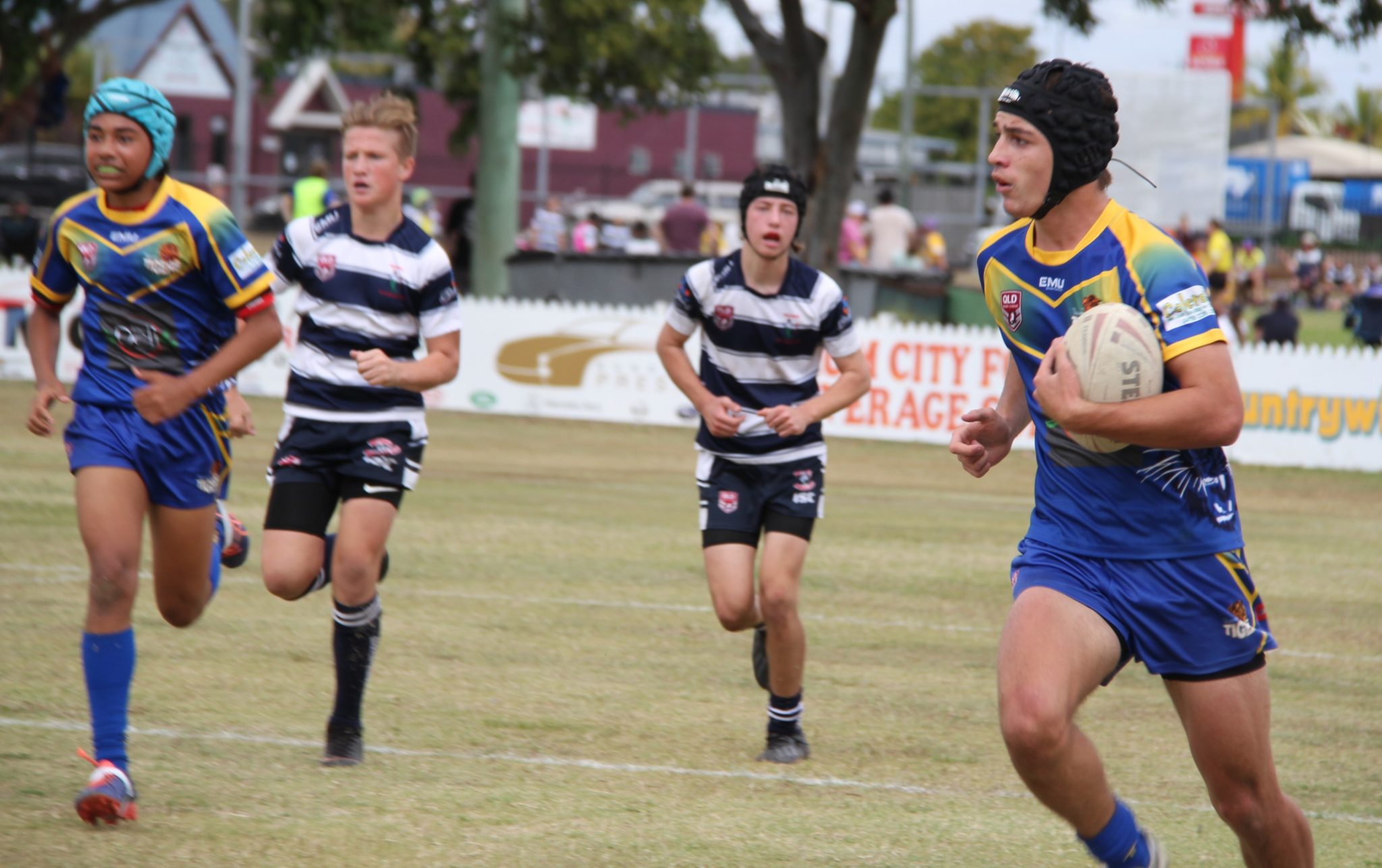 Sports report: Tom Morcom makes another attacking raid for Waves Tigers in their under-14 showdown with Brothers