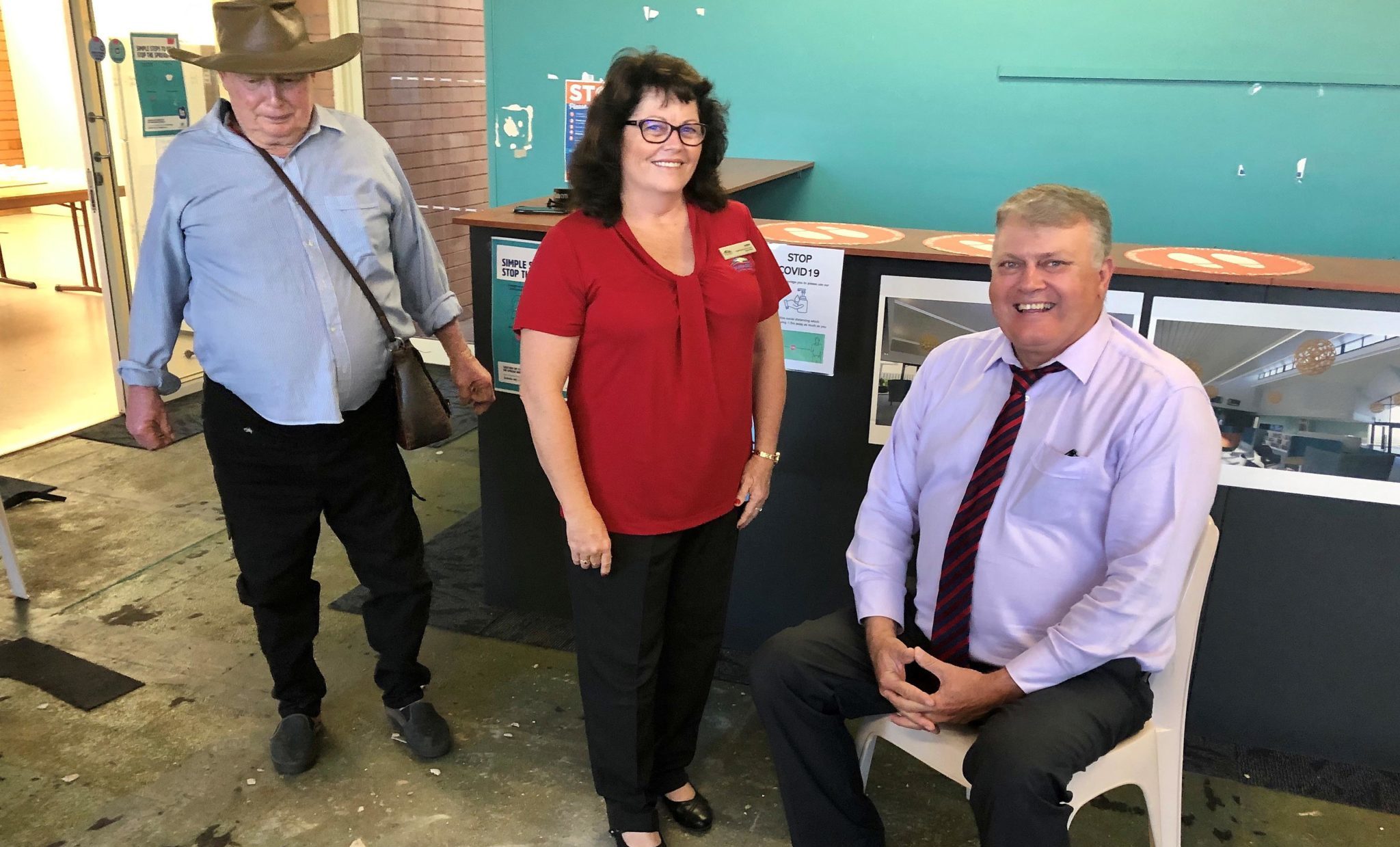 Retrieving the Kolan Centenary Time Capsule from the floor of the former Gin Gin Neighbourhood Centre brought back memories for (from left) Herb Aulfrey, Amber Larsen and Cr Wayne Honor. The capsule will be secured for a further 59 years.