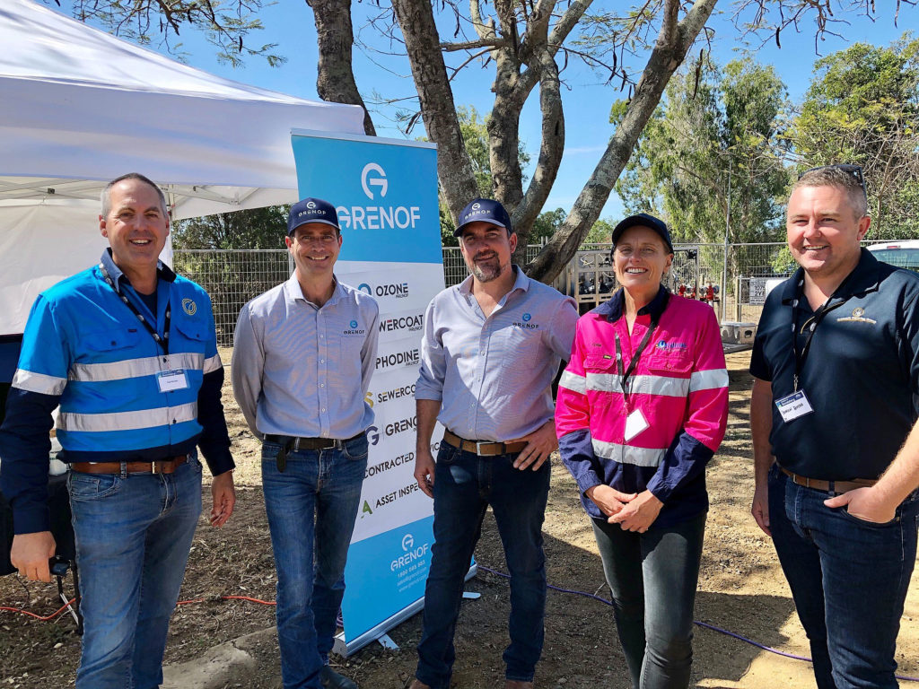 Grenof, one of the companies displaying product at the Bioeconomy Bundaberg 2020 conference attracted the interest of (from left) Oreco Group Director Paul Woosley and (at right) Fiona Waterhouse (Utilitas) and Damian Botha (Greensills Farms). Grenof Managing Director Scott Barnes and General Manager Luke Sirl were promoting their product which neutralises sewerage odour.