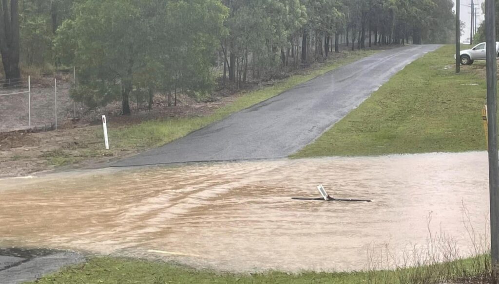 heavy rainfall water over road