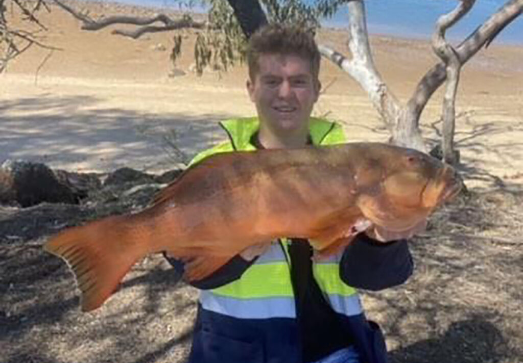 Ben Wilson with a bar cheek coral trout. 