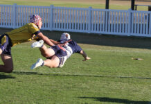 Tom Kronk scoring a try for Brothers.