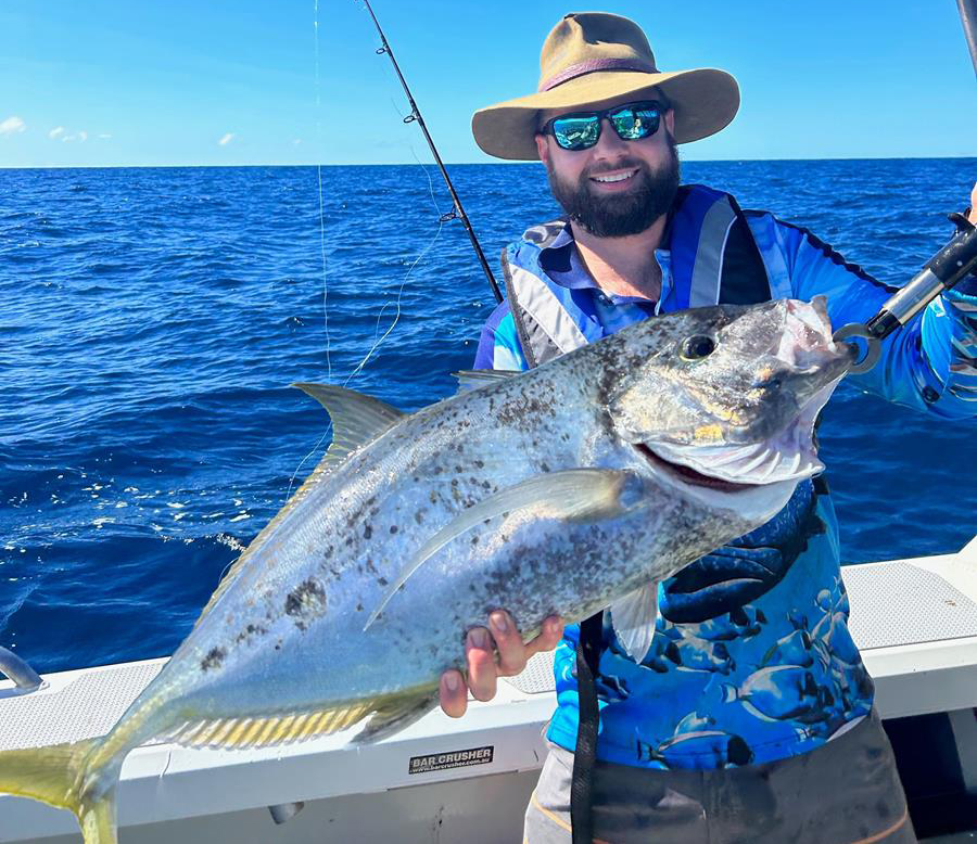 Chris McMullen with a trevally