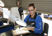 Lynley Peoples working on her creation at the Bundaberg Woodworkers Guild. woodworkers showcase