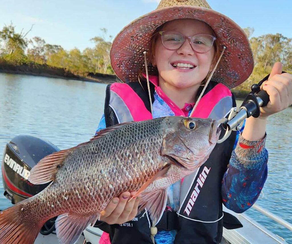 Kenzie Sergiacomi with a ripper 42cm jack Coral Reef Fin Fish